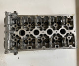 Cylinder Head Cylinder Head Opel Astra J 1.6 petrol 16V A16XER year 2012